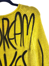 A DREAM TAKES ACTION Sweater